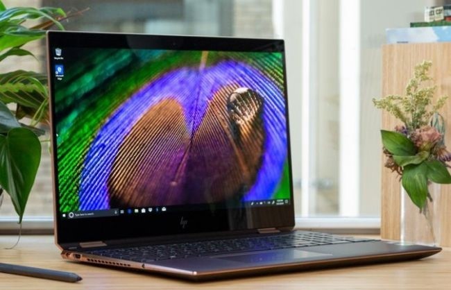 HP Spectre x360 (OLED): 483 nits; 258% sRGB